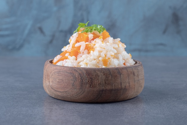 Vegetarian rice in the bowl , on the marble surface.