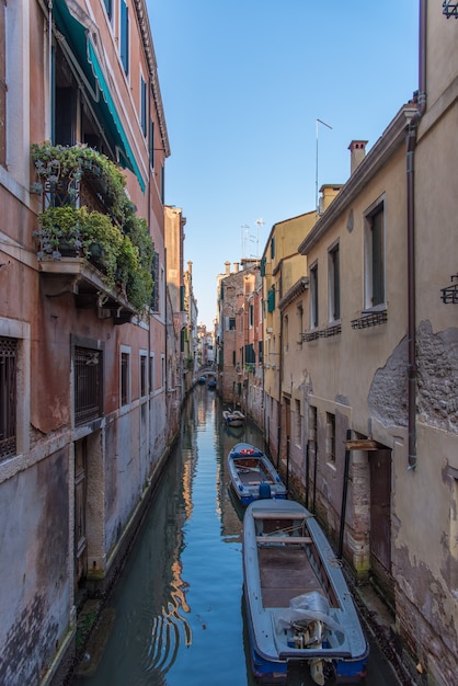 Free Photo venice canal with gondola boats