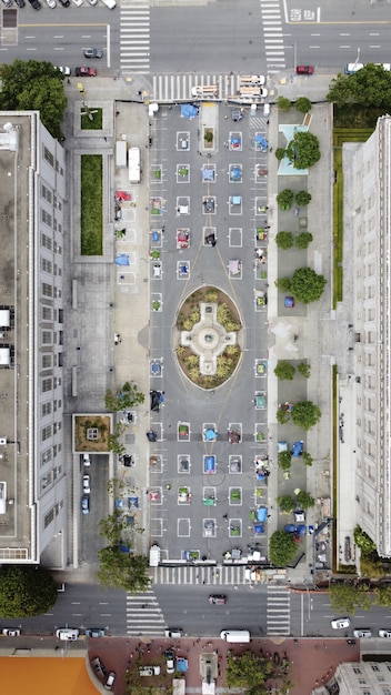 Vertical aerial shot of homeless camps on Fulton St in San Francisco during pandemic