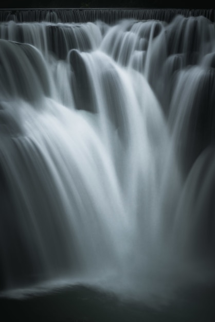 Free photo vertical beautiful shot of a waterfall