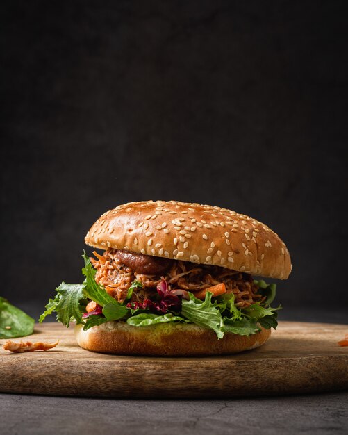 Vertical closeup shot of a delicious sandwich on a chopping board