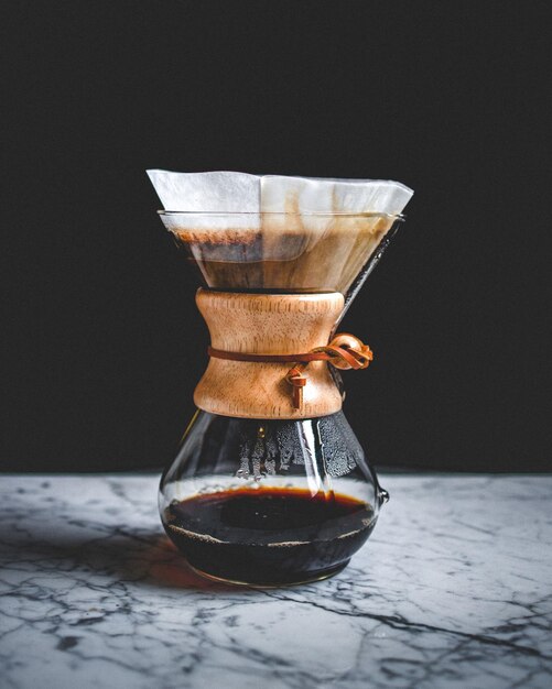 Free Photo vertical closeup shot of filtered coffee on a table