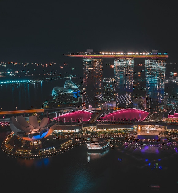 Free Photo vertical distant shot of singapore marina bay sands during nighttime in singapore