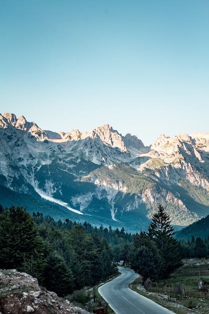 Vertical high angle shot of Valbona Valley National Park under a clear blue sky in Albania