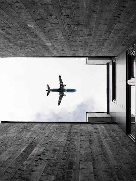 Free Photo vertical low angle shot of an airplane flying in the clear sky