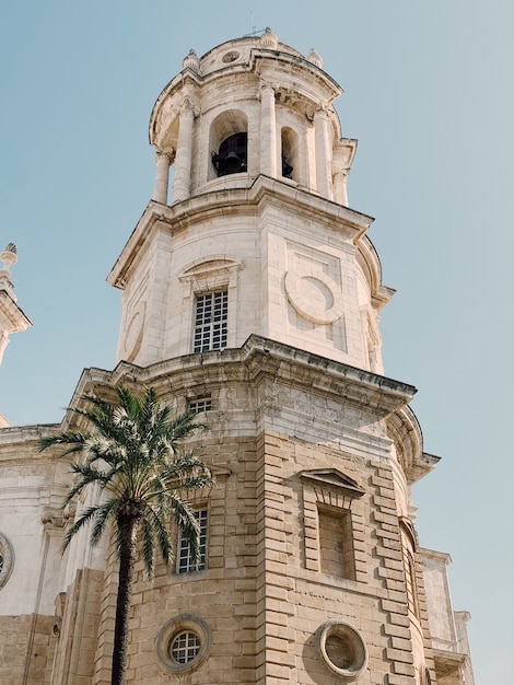 Vertical low angle shot of the Cadiz Cathedral in Cadiz, Spain