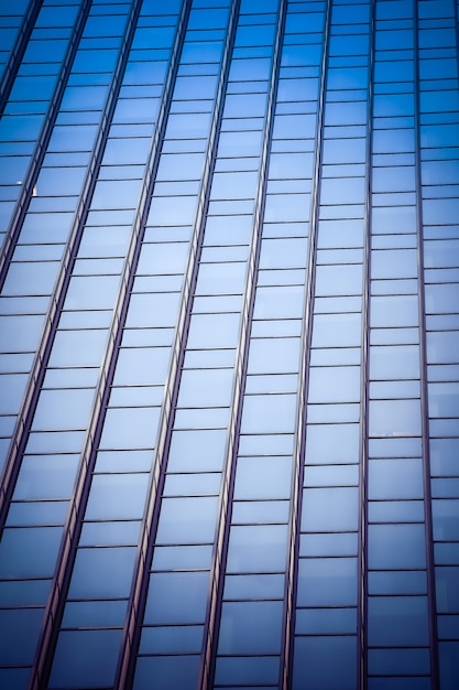 Free Photo vertical low angle shot of a glass skyscraper