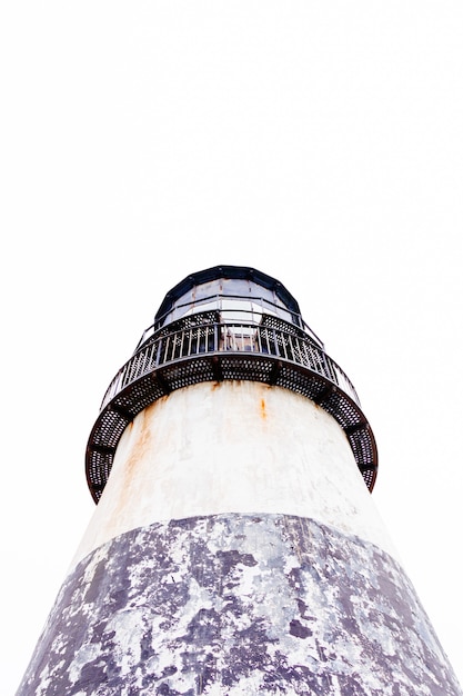 Free Photo vertical low angle shot of a lighthouse with a clear sky