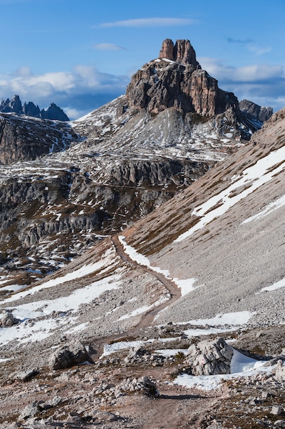 Vertical low angle shot of the Paternkofel mountain in the Italian Alps