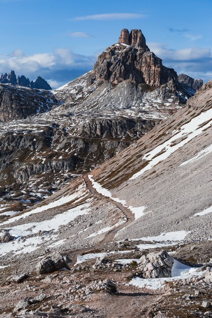 Vertical low angle shot of the Paternkofel mountain in the Italian Alps