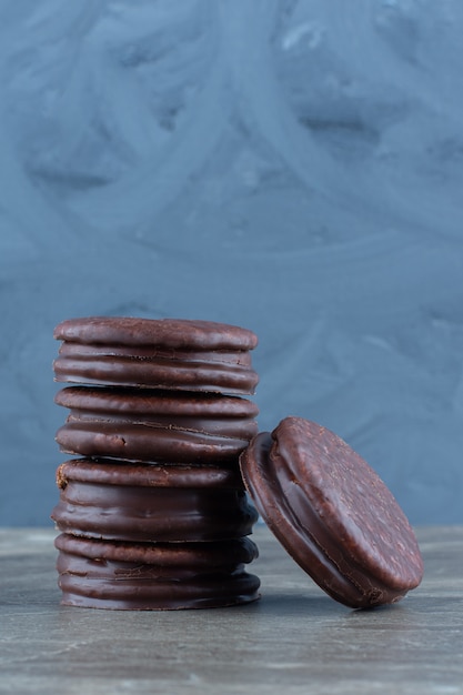 Vertical photo of homemade chocolate cookies on grey.