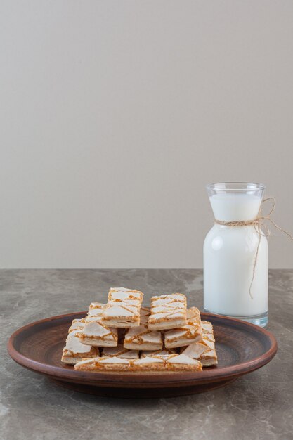 Vertical photo of homemade waffles with milk.