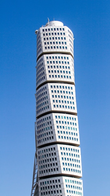 Free Photo vertical shot of the ankarparken skyscraper under a blue sky and sunlight