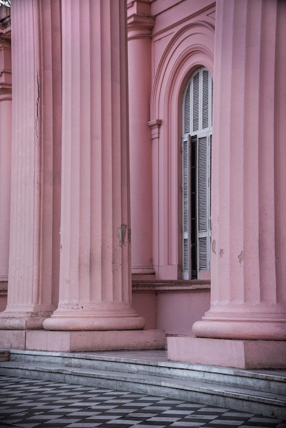 Free photo vertical shot of beautiful light pink building design