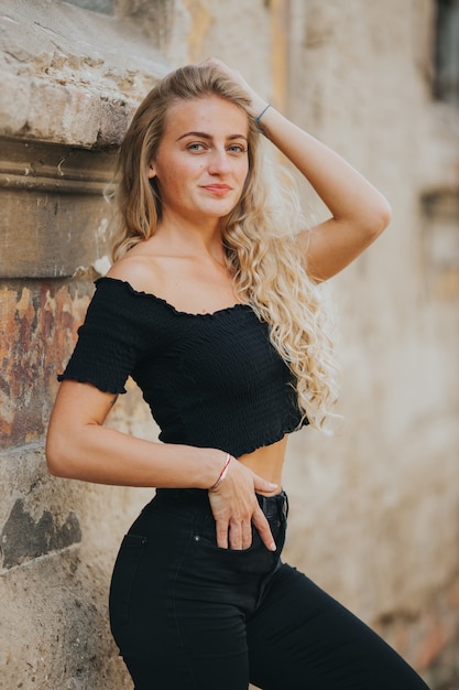 Vertical shot of beautiful smiling girl