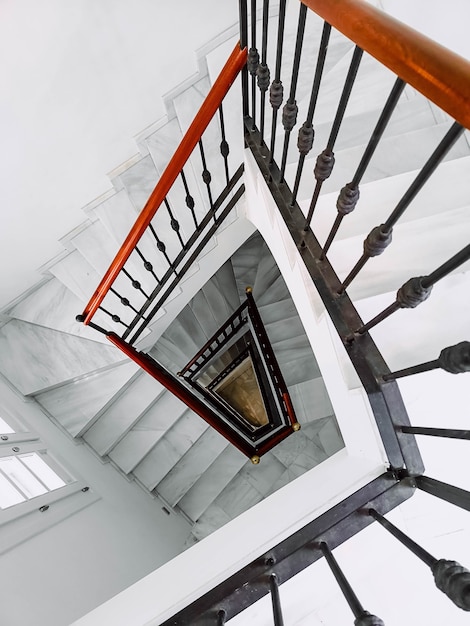 Vertical shot of a cool white staircase