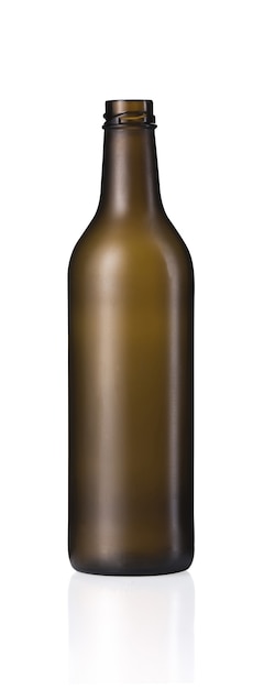 Free photo vertical shot of an empty brown glass bottle with a reflection below