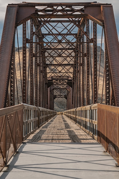 Free photo vertical shot of the guffey bridge in idaho, united states