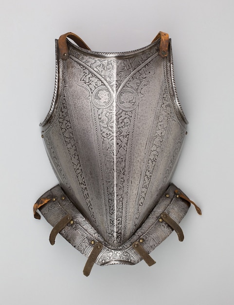 Free photo vertical shot of a medieval chest plate isolated on a white background