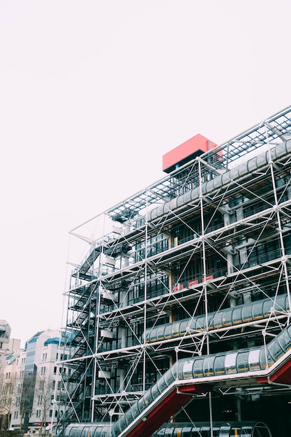 Free photo vertical shot of a metal structure under the bright sky