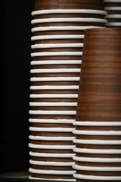 Vertical shot of paper cups stacked on each other