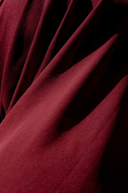 Free photo vertical shot of a red textile. it is great for a background