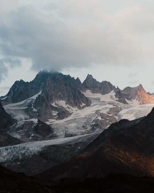 Vertical shot of the scenic snowy French Alps