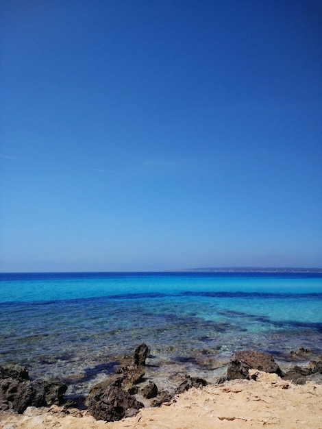 Vertical shot of the water surface from the beach in Fuerteventura, Spain