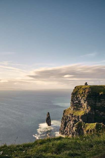 Vertical view of  Cliffs of Moher Lislorkan Ireland on  a cloudy day