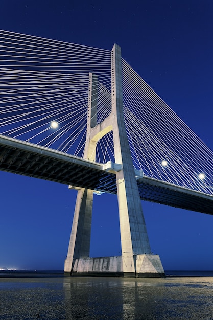 Vertical view of Vasco da Gama bridge by night, Lisbon