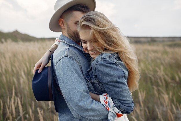 Very beautiful couple in a wheat field