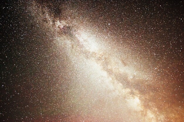 Vibrant night sky with stars and nebula and galaxy.