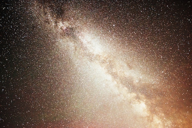 Vibrant night sky with stars and nebula and galaxy.