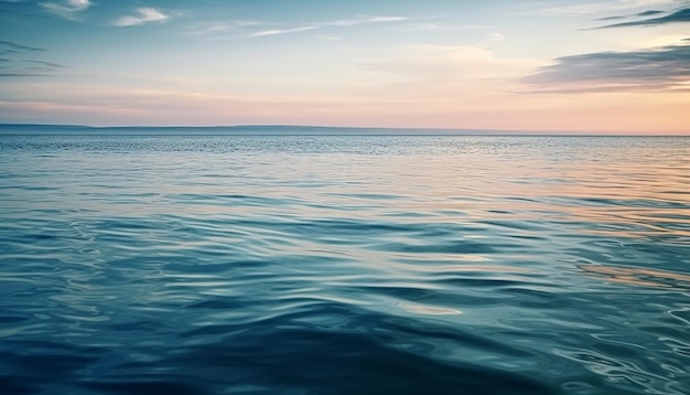 Vibrant sunset over tranquil water and sand generated by AI