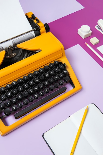 Free photo vibrantly colored retro typewriter with keyboard and buttons