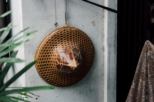 Free Photo vietnam hat hanging on the wall