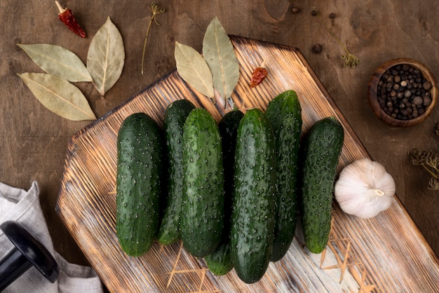 Free photo above view arrangement with cucumbers