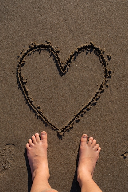 Free photo view of beach sand in summertime with message written in it