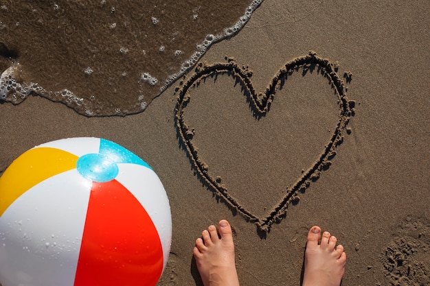 Free photo view of beach sand in summertime with message written in it