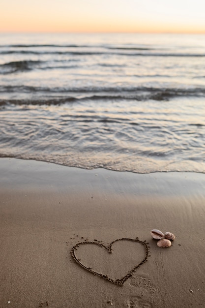 Free photo view of beach sand in summertime with message written in it