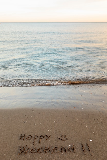 View of beach sand in summertime with message written in it