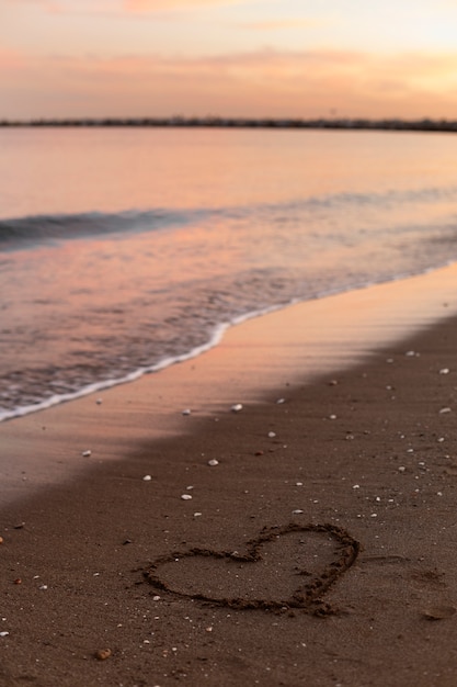 Free photo view of beach sand in summertime with message written in it