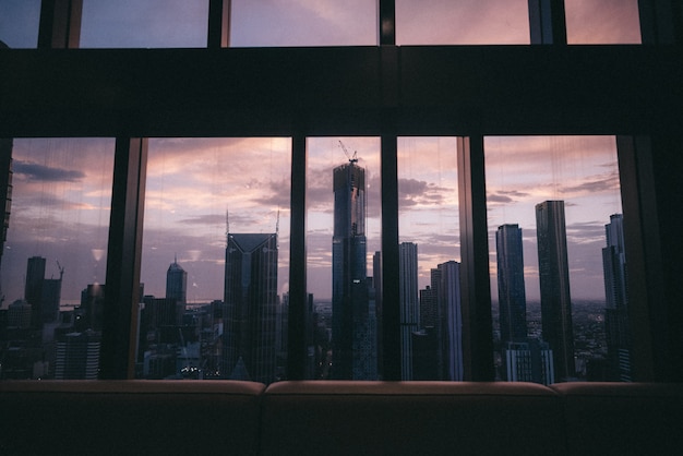 Free photo view of the beautiful urban city tall buildings and skyscrapers from a window