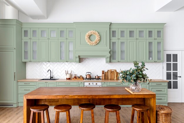 View of a beautifully decorated green kitchen