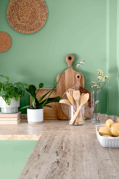 View of a beautifully decorated green kitchen