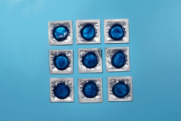 Free Photo above view blue condoms arrangement