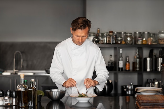 Free photo view of chef working in the kitchen