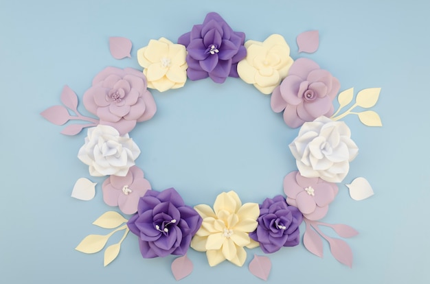 Above view circular frame with beautiful paper flowers