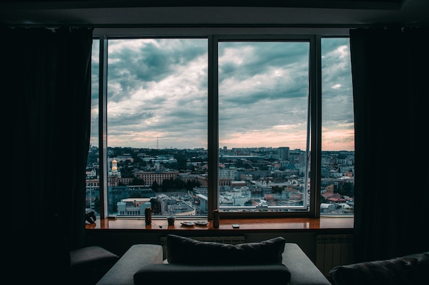 Free photo view of the city from a large window of a high house