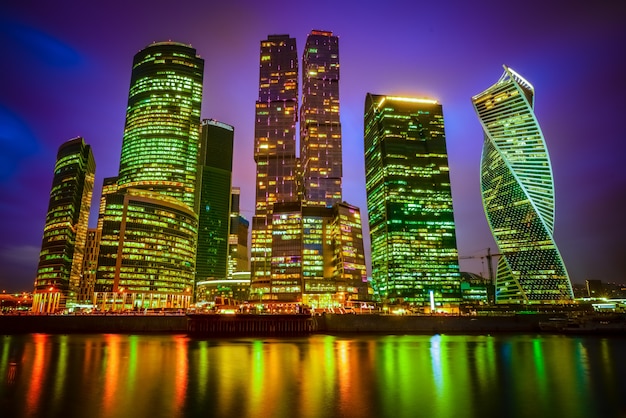 Free Photo view of a city with illuminated skyscrapers at night